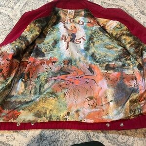 Vibrant Red Jacket with Artistic Lining